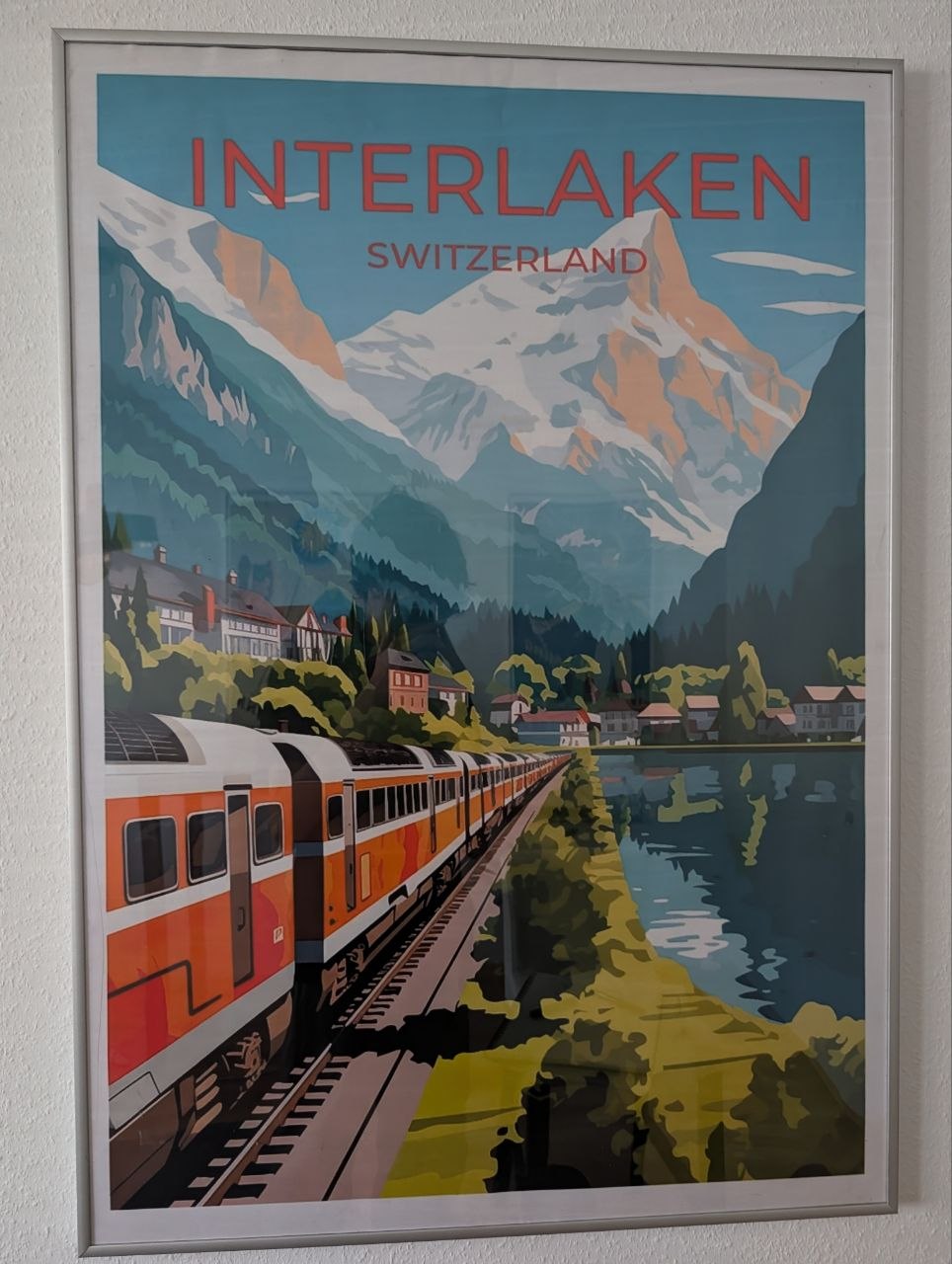 Modernes Reiseplakat «INTERLAKEN – Switzerland» mit Zug und Jungfrau-Panorama — Vorderseite